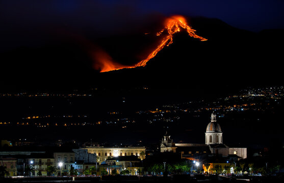 Night lava flow seen from the port of Riposto