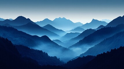 Fototapeta premium Blue toned mountain range with layered peaks and misty valleys