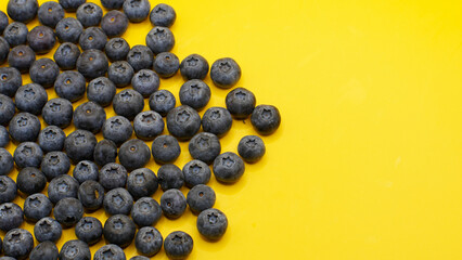 blueberries on a yellow background