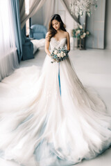 Elegant Bride with Winter Decorations in the Background – Enchanting Seasonal Wedding Scene