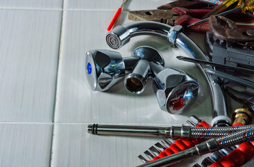 A set of plumbing tools and accessories