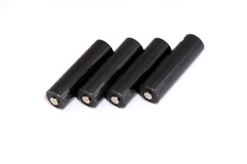 Some batteries on white background. Caring for the environment.