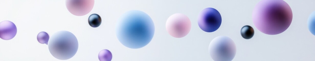 Abstract pastel spheres floating on white background.