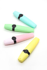 Four text markers are on a white background