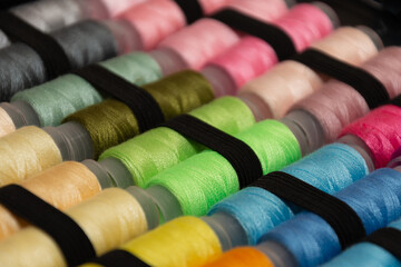 close up of the Set of colorful spools of thread