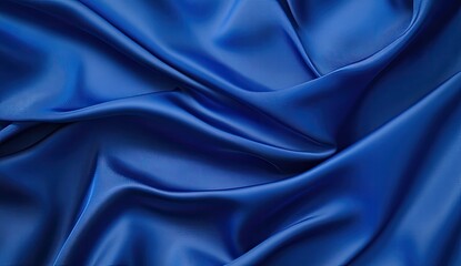 Obraz premium Smooth blue gradient backdrop transitioning from dark to light tones, blurred fabric texture with soft focus for luxury branding projects.