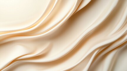 Fototapeta premium Elegant beige silk fabric with soft drapes and smooth texture.