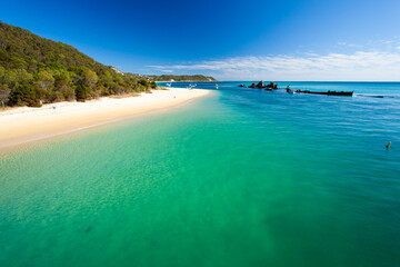 The Wrecks at Moreton Island settled in the clear blue green waters of Moreton Bay.