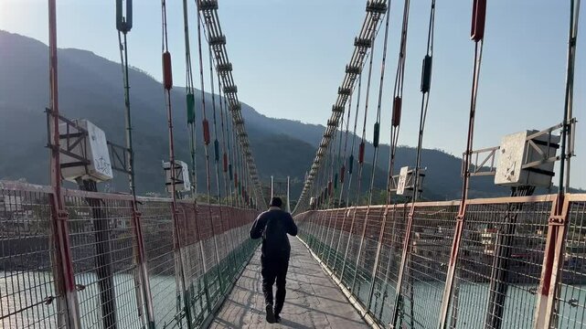 Rishikesh, Uttarakhand, India View of Ganga river embankment, Lakshman Jhula bridge and Tera Manzil Temple, Trimbakeshwar in Rishikesh
