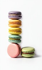 A vibrant and artistic representation of letters or numbers crafted from colorful macarons. The pastel hues of pink, green, yellow, and lavender create a visually delightful composition.