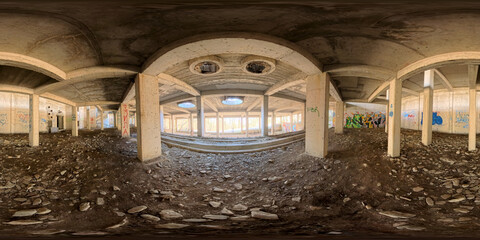 A high-quality 360 HDRI panorama of a concrete building, showcasing its raw, industrial aesthetic. The high-dynamic-range imaging captures the texture and details of the concrete surfaces.