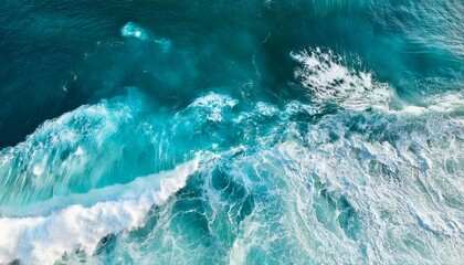 Fototapeta premium aerial view of turquoise ocean water with splashes and foam for abstract natural background