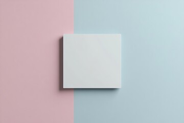 Fototapeta premium A blank canvas on a soft blue wall with a hint of pink creates a serene vibe.