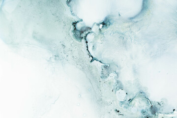 Swirling patterns in soft light tones reflect a tranquil Thai background with fluid ink effects.