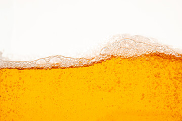 Close up bright orange Oil or beer splash texture and nature waves, Beautiful waves curve and little bubbles smooth for graphic design and background, Oil Bubbles, Soft beer bubbles, Selective focus