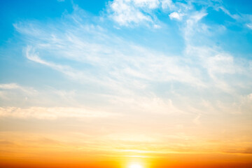 Beautiful , luxury soft gradient orange gold clouds and sunlight on the blue sky perfect for the background, take in evening,Twilight, Large size, high definition landscape photo