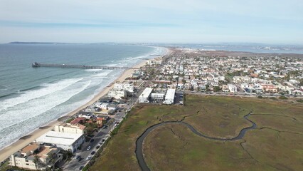 Fototapeta premium Aerial view of Imperial Beach coastline and pier.