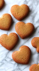 Heart-shaped cookies for marble background.