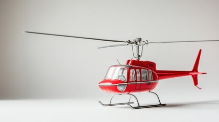 Red Helicopter Model on White Background: A Stunning Display of Aviation Miniature