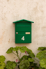 House number 4 (four) on mail box