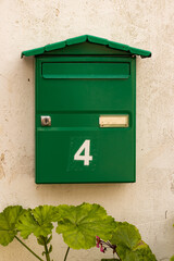 House number 4 (four) on mail box
