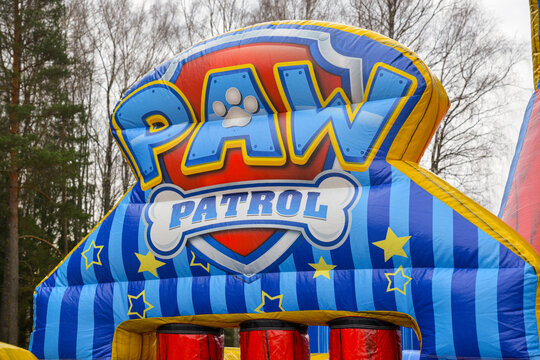 Valmiera, LATVIA. 08.03.2025 PAW PATROL logo on big inflatable bouncy slide. Paw Patrol is a Canadian animated television cartoon series for kids