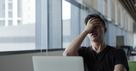 Asian businessman burn out on failed job in office. Elderly office worker expresses emotions Failed to work No success. Financial Communication Business problem. Working too hard overtime