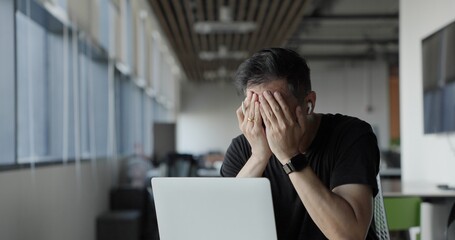 Asian businessman burn out on failed job in office. Elderly office worker expresses emotions Failed to work No success. Financial Communication Business problem. Working too hard overtime