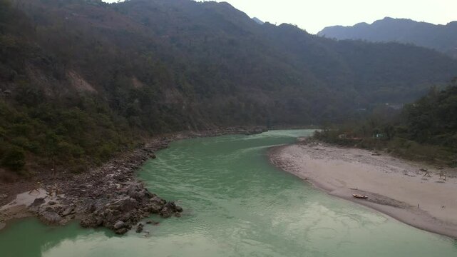 Rishikesh, Uttarakhand, India View of Ganga river embankment, Lakshman Jhula bridge and Tera Manzil Temple, Trimbakeshwar in Rishikesh
