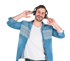 Happy man in denim shirt listening to music with headphones, smiling and enjoying the moment, isolated on white background. Concept of leisure and music