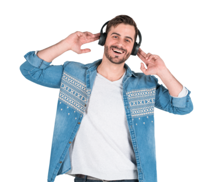 Happy man in denim shirt listening to music with headphones, smiling and enjoying the moment, isolated on white background. Concept of leisure and music