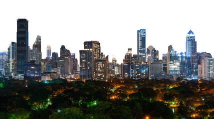 Bangkok skyline at night with illuminated skyscrapers and lush park in foreground, isolated on...