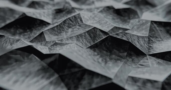 Dark Abstract Polygonal Surface Moving Smoothly. Dynamic abstract polygonal shapes slowly moving, creating a futuristic 3D background. 