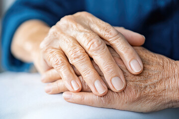 Fototapeta premium Caring hands of a therapist providing gentle massage therapy for elderly care and relaxation