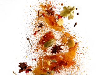 Different aromatic spices falling isolated on transparent background