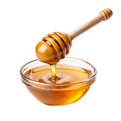 honey in a glass jar and wooden spoon
