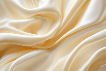 Gold golden champagne vanilla pearl white abstract background. Silk satin fabric. Curtain drapery current wave crease. Pastel soft light.