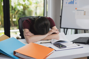 Tired stressful and upset businesswoman with graph report problem and question from project work.