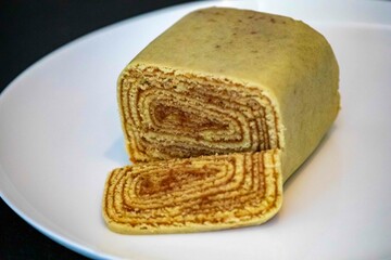 Traditional roll cake also known as Swiss roll, filled with guava paste, a typical cake from...