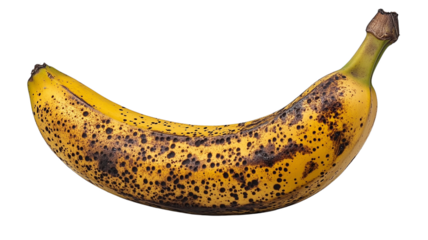ripe banana with brown spots on its yellow peel, indicating sweetness and readiness to eat. banana is isolated on transparency background, showcasing its natural texture and color