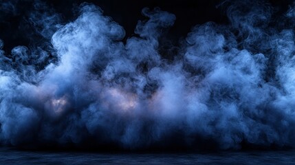 Fototapeta premium Dramatic smoke effect on dark background