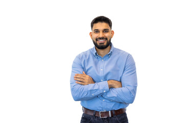 A young entrepreneur in a blue shirt stands confidently with his arms crossed, projecting success...