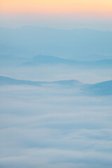 Closeup to sea fog at Sunrise time with sea of fog and clouds with mountain hill at Sri Nan National Park Doi Samer Dao Nan Province Thailand, Asia.