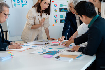 Business team analyzing financial data and developing a strategy for growth