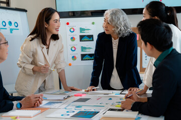 Business team discussing marketing strategy during meeting in office