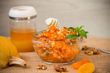 Pumpkin cooked with rice, nuts and honey