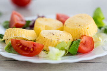 Lush egg omelette with lettuce and tomatoes on a plate