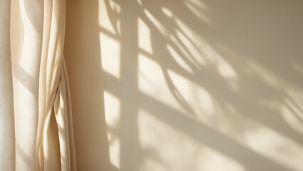 light background with blurred foliage shadow on beige wall. plaster wall and curtains in sunlight