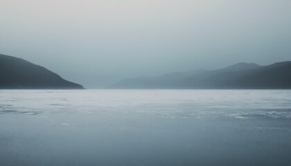 Minimalist Cool-Tone Gradient with Icy Blues and Steely Grays, Enhanced with Subtle Film Grain.