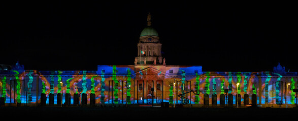 Beautiful static shot of the Custom House building with Christmas projections at night in Dublin. Christmas